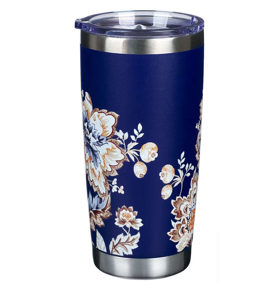 Navy blue tumbler with floral pattern on a white background