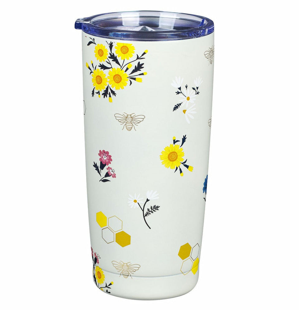 Tumbler with floral design on a white background