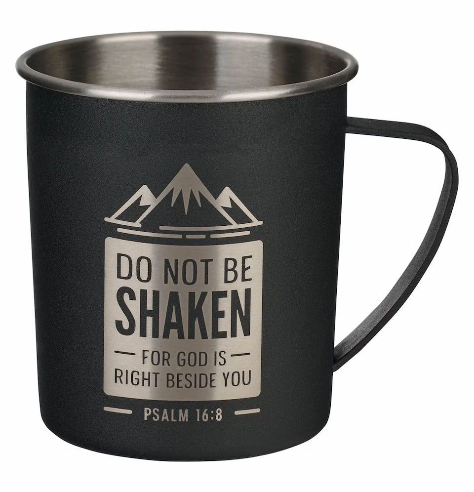 Black stainless steel camp-style mug with laser-engraved text and mountain design, handle on the side.