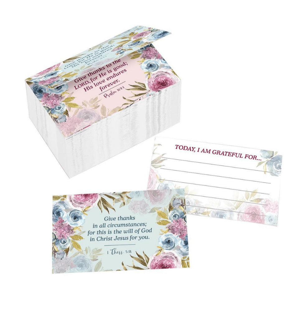 Set of gratitude cards with floral design and inspirational text in a box