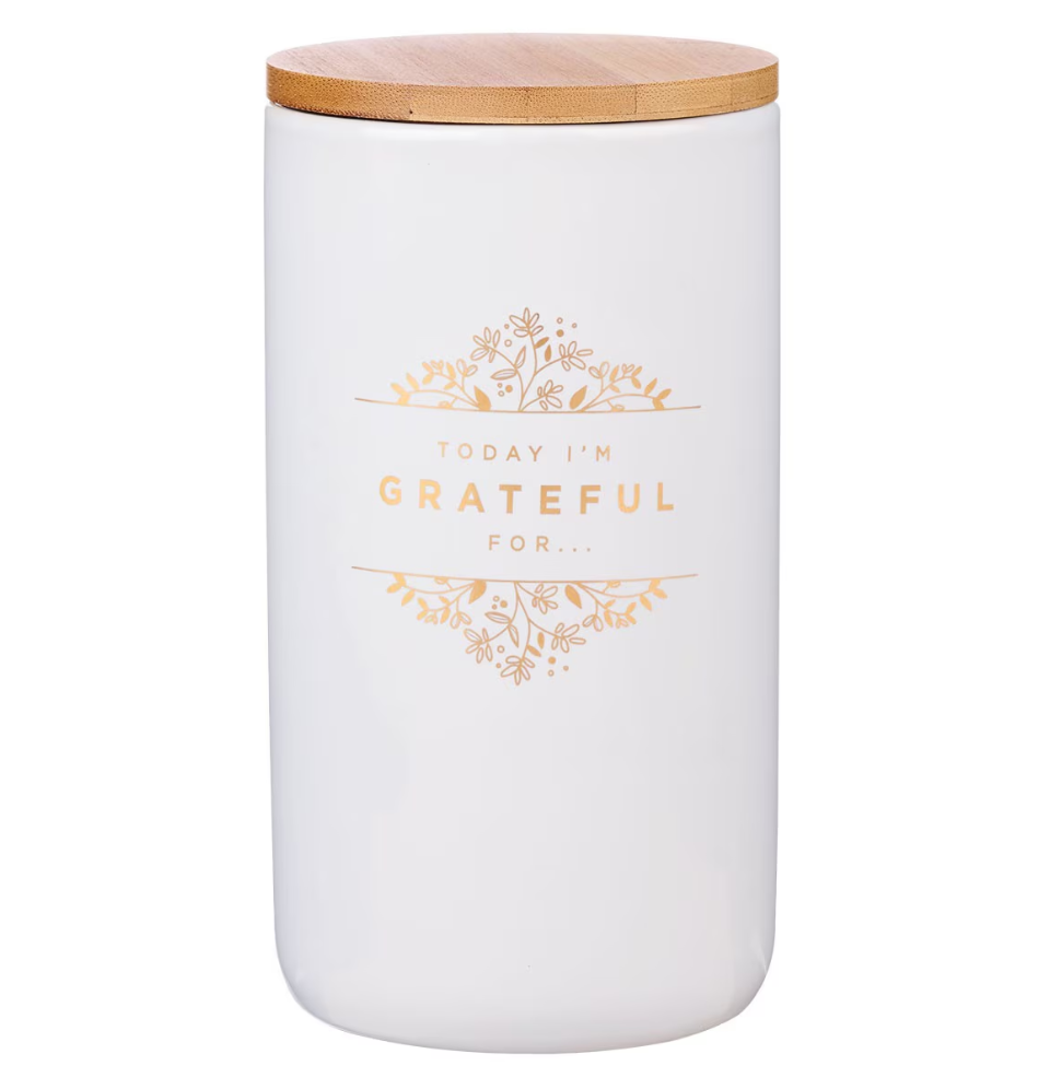 White jar with a wooden lid and 'Today I'm Grateful For' text on a white background