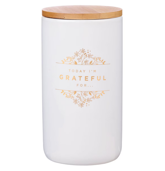 White jar with a wooden lid and 'Today I'm Grateful For' text on a white background