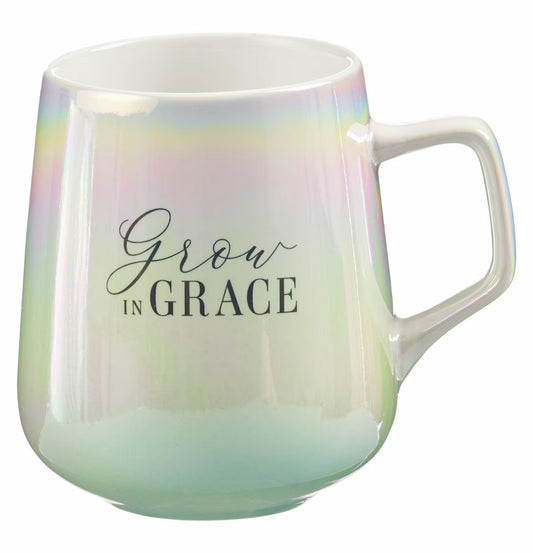 White mug with gold handle and 'Give Thanks' text, next to its packaging box on a white background