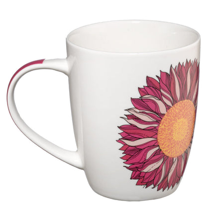 White mug with a pink sunflower design on a white background