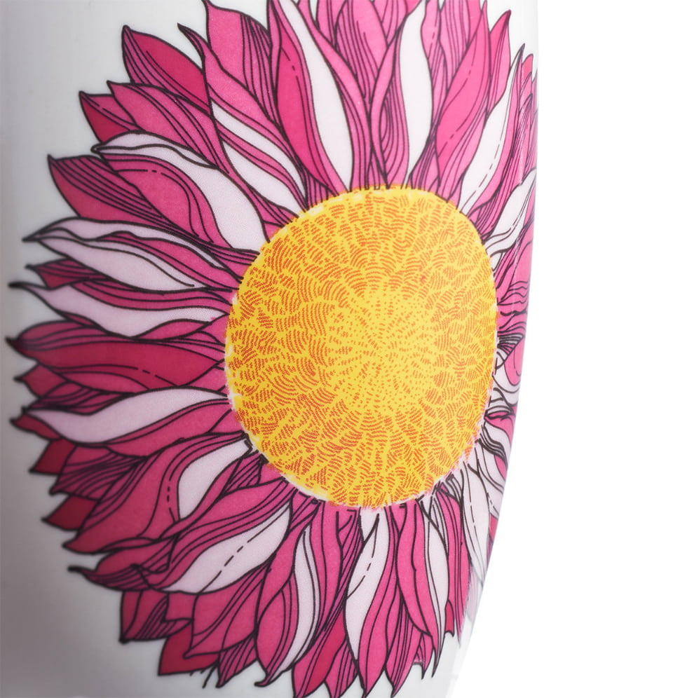 Close-up of a pink and yellow floral design on a white background