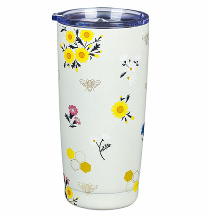 Tumbler with floral design on a white background