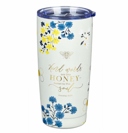 Tumbler with floral design and text on a white background