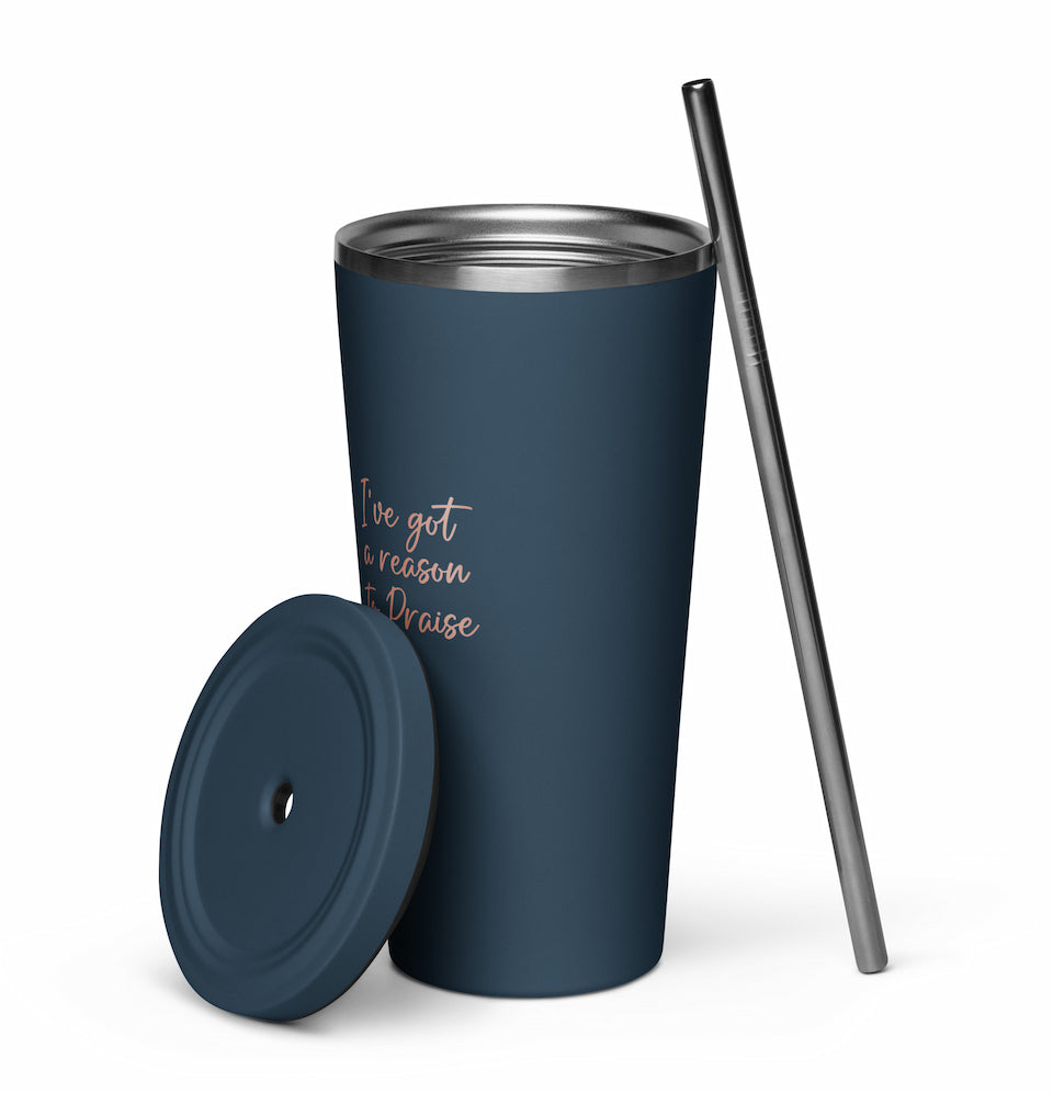 Blue insulated tumbler with lid and straw on a white background