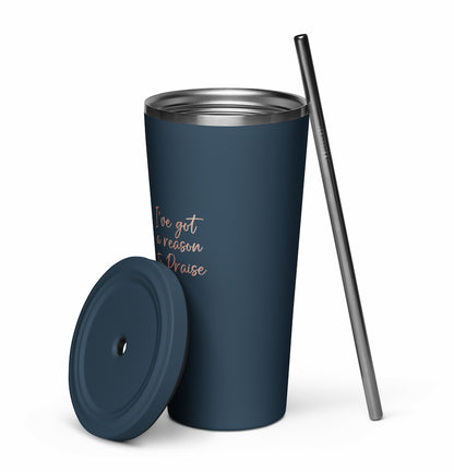 Blue insulated tumbler with lid and straw on a white background